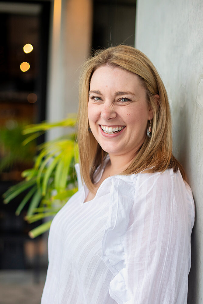 Portrait photograph of a person, shown beside a senior plan manager profile